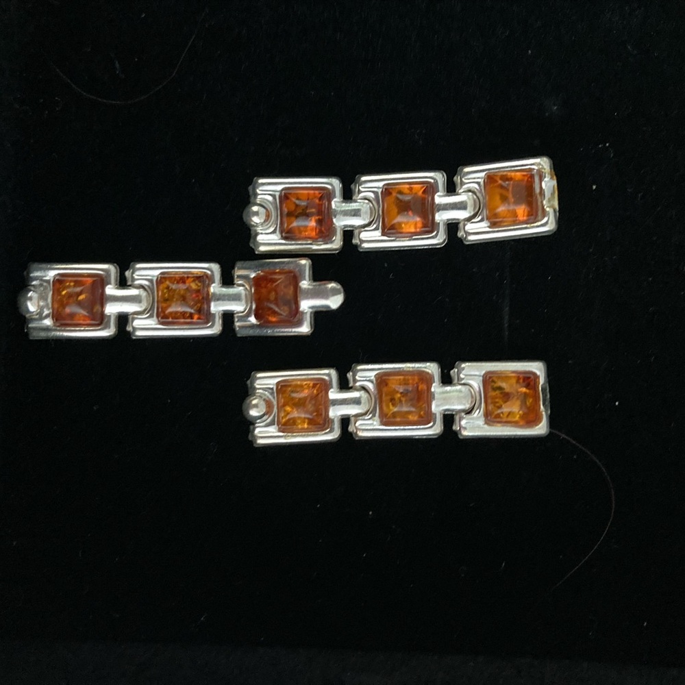 Amber and silver. Earrings and pendant set. European design.
